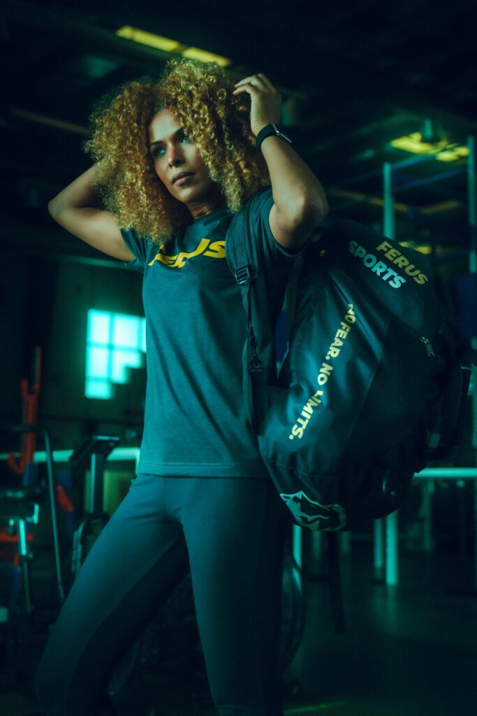 woman with gym bag 
